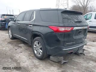 2018 Chevrolet Traverse High Country with VIN 1GNEVKKW0JJ101899, listed as a IAAI auction lot 41398396 with 107,055 mi miles. Bid and sale history available at carsss.com. Image 3.