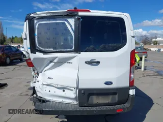 2021 Ford Transit Cargo with VIN 1FTBR2Y80MKA35393, listed as a IAAI auction lot 41732236 with 24,799 mi miles and . Bid and sale history available at DreamBid. Image 16.