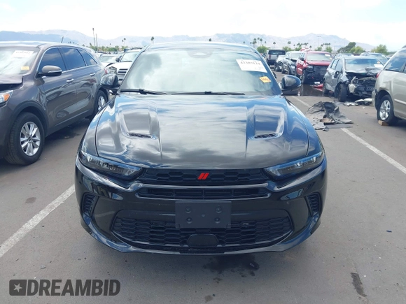 2024 Dodge Hornet GT z VIN ZACNDFAN8R3A14928, wystawiony jako IAAI lot #42387134 z przebiegiem 27 254 mil mil oraz . Historia ofert i sprzedaży dostępna na DreamBid. Obrazek 12.