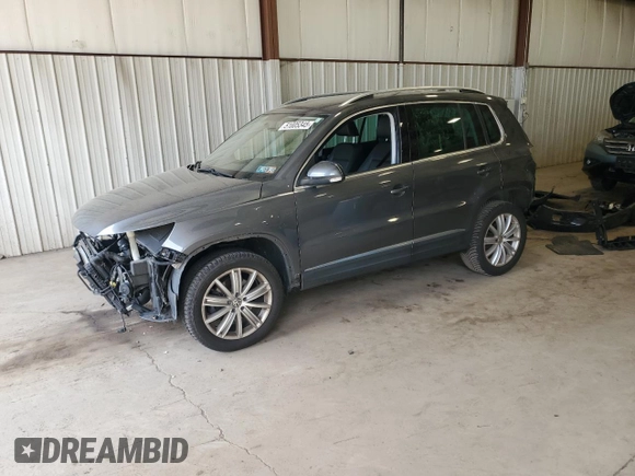 2015 Volkswagen Tiguan SE z VIN WVGBV7AX0FW588451, wystawiony jako Copart lot #51005345 z przebiegiem 104 553 mil mil oraz Szkoda całkowita • Salvage title. Historia ofert i sprzedaży dostępna na DreamBid. Obrazek 1.