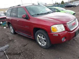 2006 GMC Envoy Denali with VIN 1GKET63M762119339, listed as a IAAI auction lot 41837443 with 192,458 mi miles. Bid and sale history available at carsss.com. Image 1.