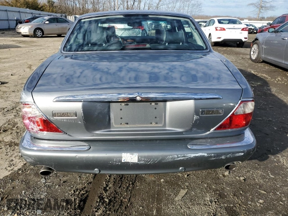 2003 Jaguar XJ 8 z VIN SAJDA14C83LF55424, wystawiony jako Copart lot #86324864 z przebiegiem 110 244 mil mil oraz Szkoda całkowita • Salvage title. Historia ofert i sprzedaży dostępna na DreamBid. Obrazek 6.