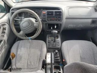 1999 Suzuki Grand Vitara LX with VIN JS3TD62V0X4124366, listed as a Copart auction lot 50885055 with 204,168 mi miles and Salvage Title. Bid and sale history available at carsss.com. Image 8.
