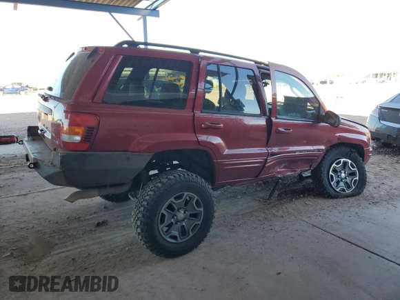 2002 Jeep Grand Cherokee Limited с VIN 1J4GW58N22C126821, выставлен на аукционе Copart как лот 46304015 с пробегом 157 932 миль миль и Списание • Salvage title. История ставок и продаж доступна на DreamBid. Изображение 3.
