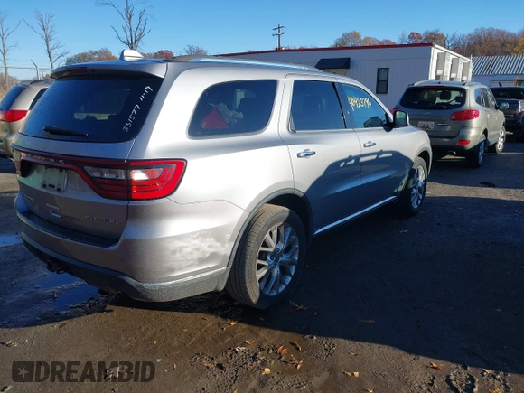 2014 Dodge Durango Citadel z VIN 1C4SDJET4EC331577, wystawiony jako IAAI lot #40923796 z przebiegiem 83 154 mil mil oraz . Historia ofert i sprzedaży dostępna na DreamBid. Obrazek 4.