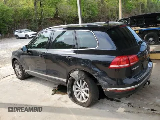 2016 Volkswagen Touareg Sport with VIN WVGEF9BP3GD007543, listed as a Copart auction lot 52806715 with 121,404 mi miles and Salvage Title. Bid and sale history available at DreamBid. Image 2.