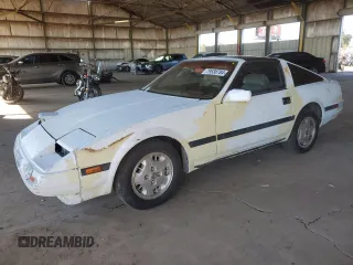 1985 Nissan 300ZX z VIN JN1HZ14S2FX097084, wystawiony jako Copart lot #79538784 z przebiegiem 233 865 mil mil oraz Czysty tytuł • Clean title. Historia ofert i sprzedaży dostępna na DreamBid. Obrazek 1.