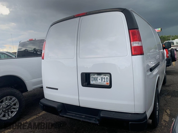 2021 Chevrolet Express Cargo with VIN 1GCWGAFP2M1303233, listed as a IAAI auction lot 42731173 with 57,034 mi miles and . Bid and sale history available at DreamBid. Image 23.
