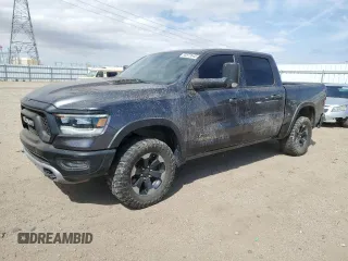 2020 Ram 1500 Rebel with VIN 1C6SRFLT1LN214727, listed as a Copart auction lot 53873645 with 101,978 mi miles and Salvage title. Bid and sale history available at DreamBid. Image 1.