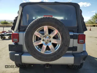 2015 Jeep Wrangler Sahara с VIN 1C4AJWBG1FL742588, выставлен на аукционе Copart как лот 72400274 с пробегом 139 520 миль миль и Списание • Salvage title. История ставок и продаж доступна на DreamBid. Изображение 6.