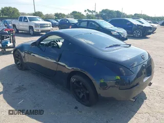 2003 Nissan 350Z Enthusiast with VIN JN1AZ34D83T107831, listed as a IAAI auction lot 41474603 with 135,137 mi miles. Bid and sale history available at carsss.com. Image 3.