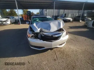 2014 Acura ILX z VIN 19VDE1F32EE008473, wystawiony jako Copart lot #51695405 z przebiegiem 149 913 mil mil oraz Szkoda całkowita • Salvage title. Historia ofert i sprzedaży dostępna na DreamBid. Obrazek 10.