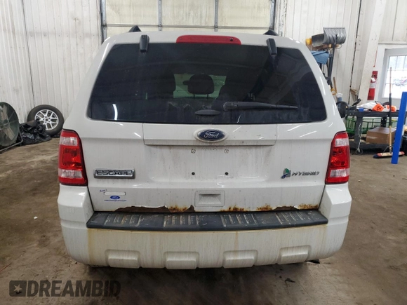 2012 Ford Escape Hybrid z VIN 1FMCU5K37CKB20209, wystawiony jako Copart lot #47182745 z przebiegiem Nie podano mil oraz Szkoda całkowita • Salvage title. Historia ofert i sprzedaży dostępna na DreamBid. Obrazek 6.