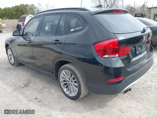 2013 BMW X1 xDrive28i with VIN WBAVL1C58DVR82070, listed as a IAAI auction lot 41849986 with 136,394 mi miles. Bid and sale history available at carsss.com. Image 3.