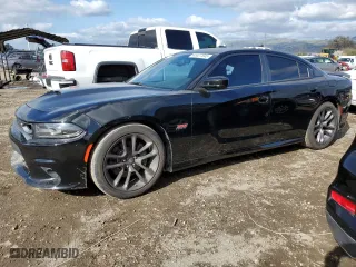 2020 Dodge Charger Scat Pack with VIN 2C3CDXGJ4LH247969, listed as a Copart auction lot 45527845 with 69,817 mi miles and Salvage Title. Bid and sale history available at carsss.com. Image 1.