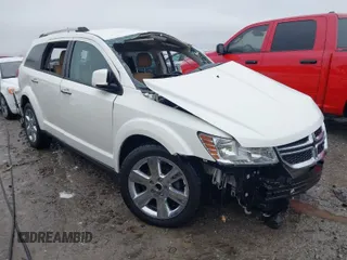 2012 Dodge Journey Crew with VIN 3C4PDCDG7CT165224, listed as a IAAI auction lot 41568580 with 140,211 mi miles and . Bid and sale history available at DreamBid. Image 1.