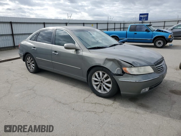 2006 Hyundai Azera SE z VIN KMHFC46F76A054625, wystawiony jako Copart lot #56588315 z przebiegiem 178 667 mil mil oraz Szkoda całkowita • Salvage title. Historia ofert i sprzedaży dostępna na DreamBid. Obrazek 4.