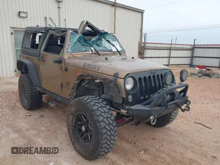 2015 Jeep Wrangler Sport with VIN 1C4AJWAG5FL589814, listed as a IAAI auction lot 39073787 with 113,776 mi miles. Bid and sale history available at carsss.com. Image 1.