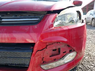 2014 Ford Escape SE with VIN 1FMCU9G90EUD71021, listed as a IAAI auction lot 42052487 with 154,811 mi miles and . Bid and sale history available at DreamBid. Image 18.
