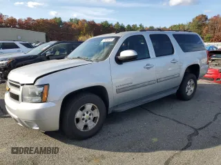 2013 Chevrolet Suburban LS with VIN 1GNSKHE76DR182853, listed as a Copart auction lot 77816574 with 232,842 mi miles and Clean Title. Bid and sale history available at carsss.com. Image 1.