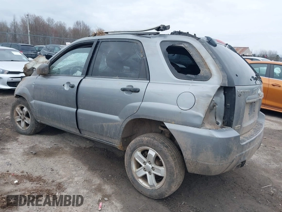 2010 Kia Sportage LX with VIN KNDKGCA33A7718634, listed as a IAAI auction lot 41868565 with 197,967 mi miles and . Bid and sale history available at carsss.com. Image 3.