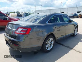 2018 Ford Taurus SEL z VIN 1FAHP2E81JG111809, wystawiony jako IAAI lot #42228720 z przebiegiem 83 532 mil mil oraz . Historia ofert i sprzedaży dostępna na DreamBid. Obrazek 4.