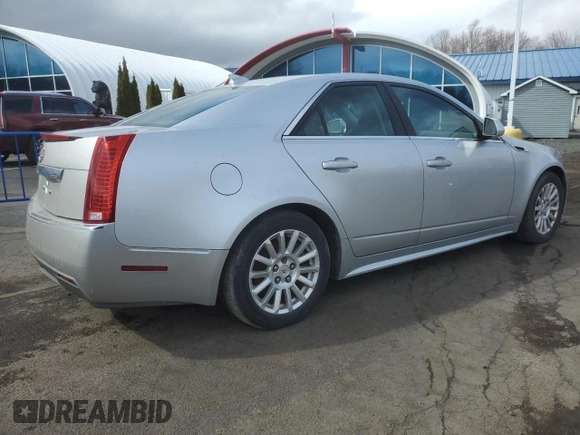 2012 Cadillac CTS z VIN 1G6DC5E59C0125371, wystawiony jako Copart lot #45761045 z przebiegiem 149 624 mil mil oraz Czysty tytuł • Clean title. Historia ofert i sprzedaży dostępna na DreamBid. Obrazek 3.