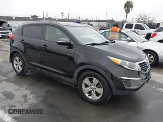 2013 Kia Sportage LX with VIN KNDPB3A27D7452499, listed as a IAAI auction lot 42164249 with 169,845 mi miles. Bid and sale history available at carsss.com. Image 1.