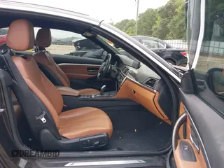 2014 BMW 4 Series 435i with VIN WBA3T3C50EJ876997, listed as a IAAI auction lot 42406299 with 115,048 mi miles and . Bid and sale history available at DreamBid. Image 5.