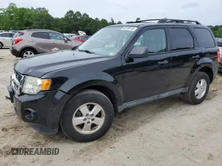 2012 Ford Escape XLS z VIN 1FMCU9C71CKA30319, wystawiony jako Copart lot #60189745 z przebiegiem 214 736 mil mil oraz Szkoda całkowita • Salvage title. Historia ofert i sprzedaży dostępna na DreamBid. Obrazek 1.