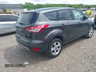 2016 Ford Escape SE with VIN 1FMCU9GXXGUC81604, listed as a IAAI auction lot 42222349 with 106,188 mi miles and . Bid and sale history available at DreamBid. Image 4.