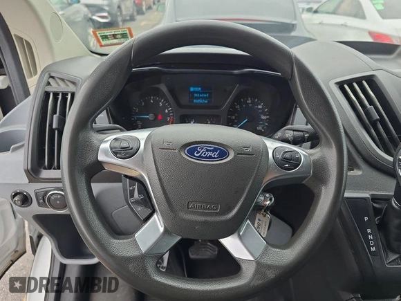 2018 Ford Transit with VIN 1FTYE1YM9JKB51975, listed as a IAAI auction lot 42729136 with 48,562 mi miles and . Bid and sale history available at DreamBid. Image 7.
