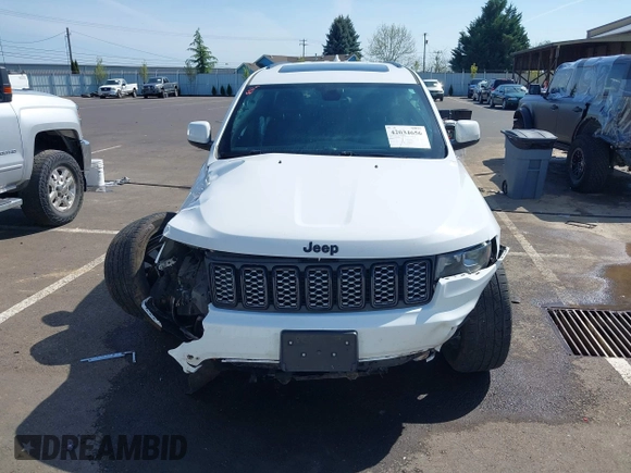 2018 Jeep Grand Cherokee Altitude with VIN 1C4RJFAG0JC296947, listed as a IAAI auction lot 42034656 with 93,979 mi miles and . Bid and sale history available at DreamBid. Image 13.
