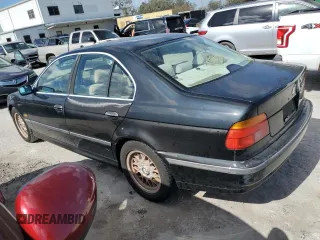 2000 BMW 5 Series 528iA with VIN WBADM6340YGU16735, listed as a Copart auction lot 77249644 with 0 mi miles and Salvage Title. Bid and sale history available at carsss.com. Image 2.