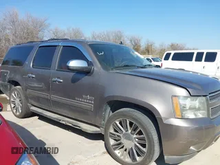 2011 Chevrolet Suburban LT with VIN 1GNSCJE03BR381301, listed as a IAAI auction lot 41412636 with 243,601 mi miles. Bid and sale history available at carsss.com. Image 2.