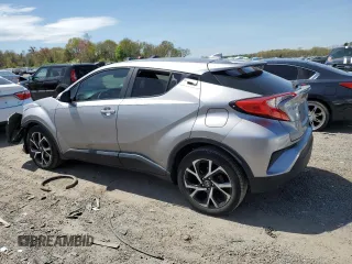 2018 Toyota C-HR XLE z VIN NMTKHMBX8JR001011, wystawiony jako Copart lot #55469265 z przebiegiem 106 938 mil mil oraz Szkoda całkowita • Salvage title. Historia ofert i sprzedaży dostępna na DreamBid. Obrazek 2.