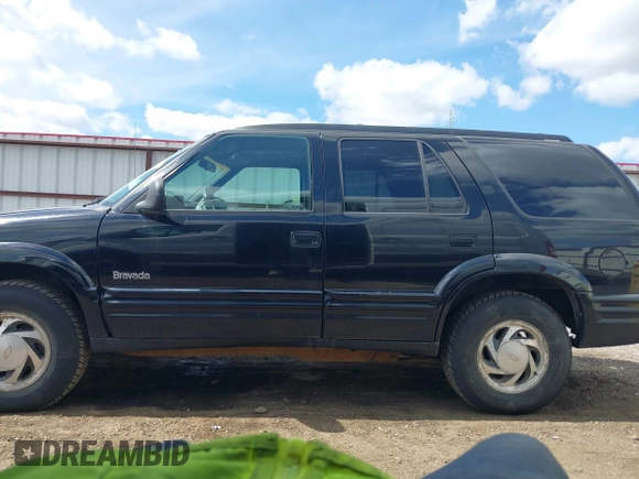 1997 Oldsmobile Bravada z VIN 1GHDT13W3V2707243, wystawiony jako IAAI lot #42024114 z przebiegiem 185 219 mil mil oraz . Historia ofert i sprzedaży dostępna na DreamBid. Obrazek 14.