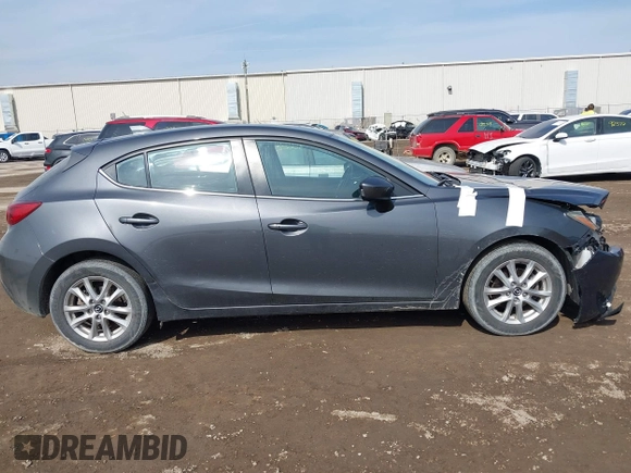 2014 Mazda 3 i Grand Touring with VIN JM1BM1M74E1212699, listed as a IAAI auction lot 41804428 with 195,472 mi miles and . Bid and sale history available at DreamBid. Image 13.