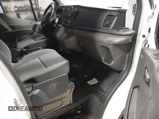 2023 Ford Transit Cargo with VIN 1FTBR2C88PKB17299, listed as a IAAI auction lot 41951132 with 19,461 mi miles and . Bid and sale history available at DreamBid. Image 5.