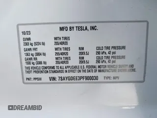 2023 Tesla Model Y Long Range with VIN 7SAYGDEE3PF900030, listed as a IAAI auction lot 41147192 with 13,903 mi miles and . Bid and sale history available at DreamBid. Image 9.