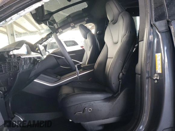 2023 Tesla Model X with VIN 7SAXCDE55PF410146, listed as a Copart auction lot 48818085 with 26,494 mi miles and Salvage Title. Bid and sale history available at DreamBid. Image 7.