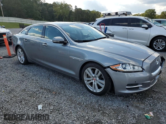 2015 Jaguar XJ Portfolio with VIN SAJWJ2GD2F8V75238, listed as a Copart auction lot 73633984 with 102,545 mi miles and Salvage title. Bid and sale history available at DreamBid. Image 4.