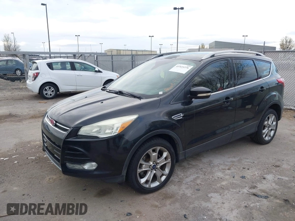 2015 Ford Escape Titanium with VIN 1FMCU9J96FUA27221, listed as a IAAI auction lot 41925276 with 180,758 mi miles and . Bid and sale history available at carsss.com. Image 2.