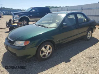 2002 Mazda Protege DX with VIN JM1BJ225121567924, listed as a Copart auction lot 54847545 with 93,653 mi miles and Salvage Title. Bid and sale history available at DreamBid. Image 1.