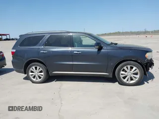 2013 Dodge Durango Crew with VIN 1C4SDHDT5DC637535, listed as a IAAI auction lot 41867982 with 162,569 mi miles and . Bid and sale history available at DreamBid. Image 13.