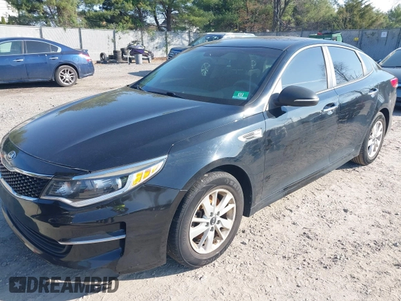 2016 Kia Optima LX with VIN 5XXGT4L36GG105637, listed as a IAAI auction lot 42013800 with 111,836 mi miles. Bid and sale history available at carsss.com. Image 16.