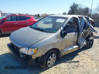 2000 Toyota Sienna CE with VIN 4T3ZF19CXYU187635, listed as a IAAI auction lot 41774700 with 98,463 mi miles. Bid and sale history available at carsss.com. Image 2.