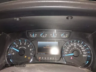 2014 Ford F-150 XL with VIN 1FTFW1EF7EKG57692, listed as a IAAI auction lot 41996378 with 111,113 mi miles. Bid and sale history available at carsss.com. Image 7.