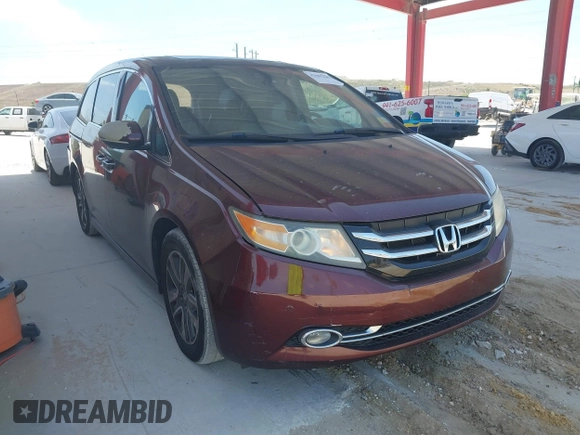 2014 Honda Odyssey Touring with VIN 5FNRL5H90EB080889, listed as a IAAI auction lot 42085305 with 123,286 mi miles and . Bid and sale history available at carsss.com. Image 1.