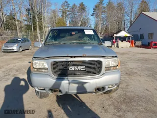 2000 GMC Denali with VIN 1GKEK13R7YR159609, listed as a IAAI auction lot 41828674 with 231,627 mi miles. Bid and sale history available at carsss.com. Image 13.